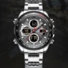 IMA5-RELOJ3 Reloj Naviforce 9197 S plateado con esfera gris, pantallas digitales y detalles rojos, vista frontal.